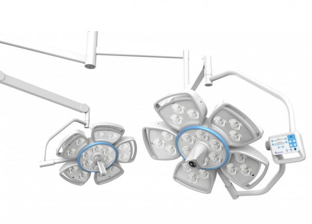 Why is an operating lamp in an operating room essential?